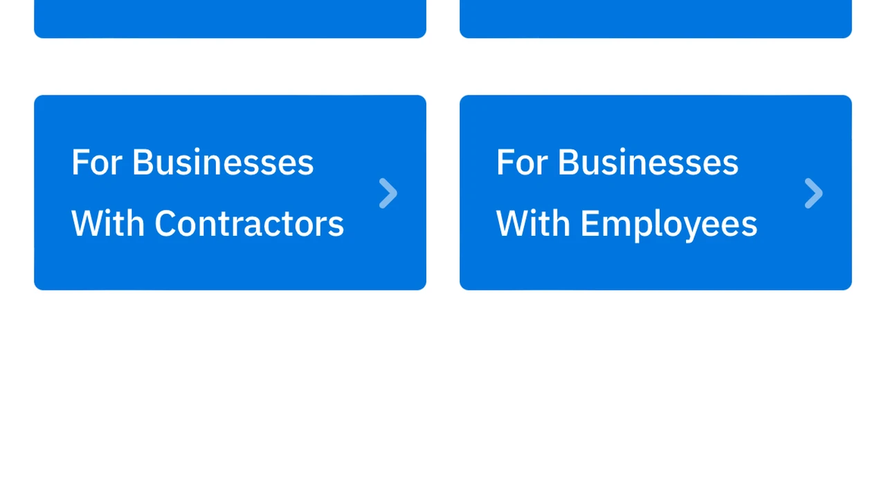overhead view of corned beef sliced and on a platter with cabbage, potatoes, and carrots